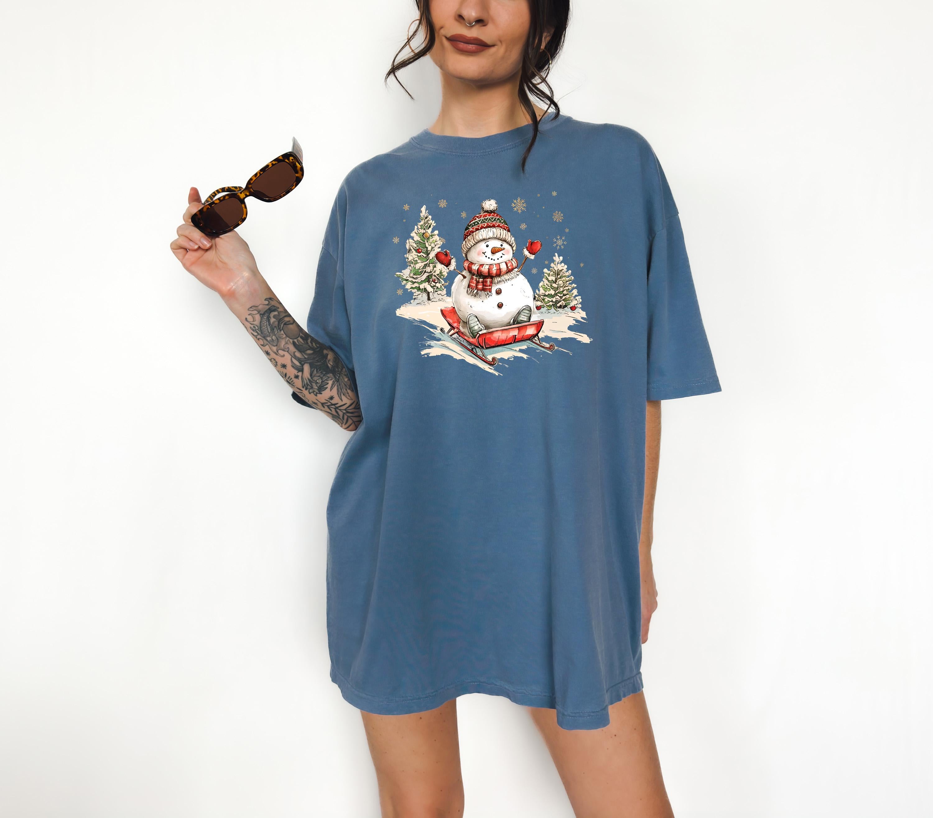 Nostalgic Sledding Snowman Comfort Colors Shirt, Retro Christmas TShirt, Unisex Holiday Shirt, Cozy T, Christmas Design, Christmas 2025