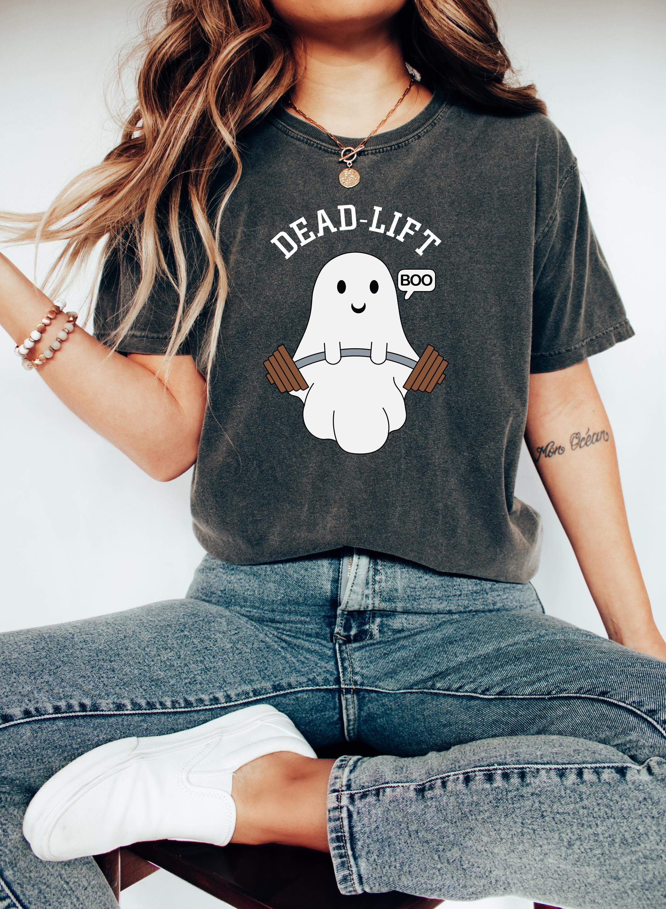 Cute ghost dead lifting weights on a pepper comfort colors shirt.