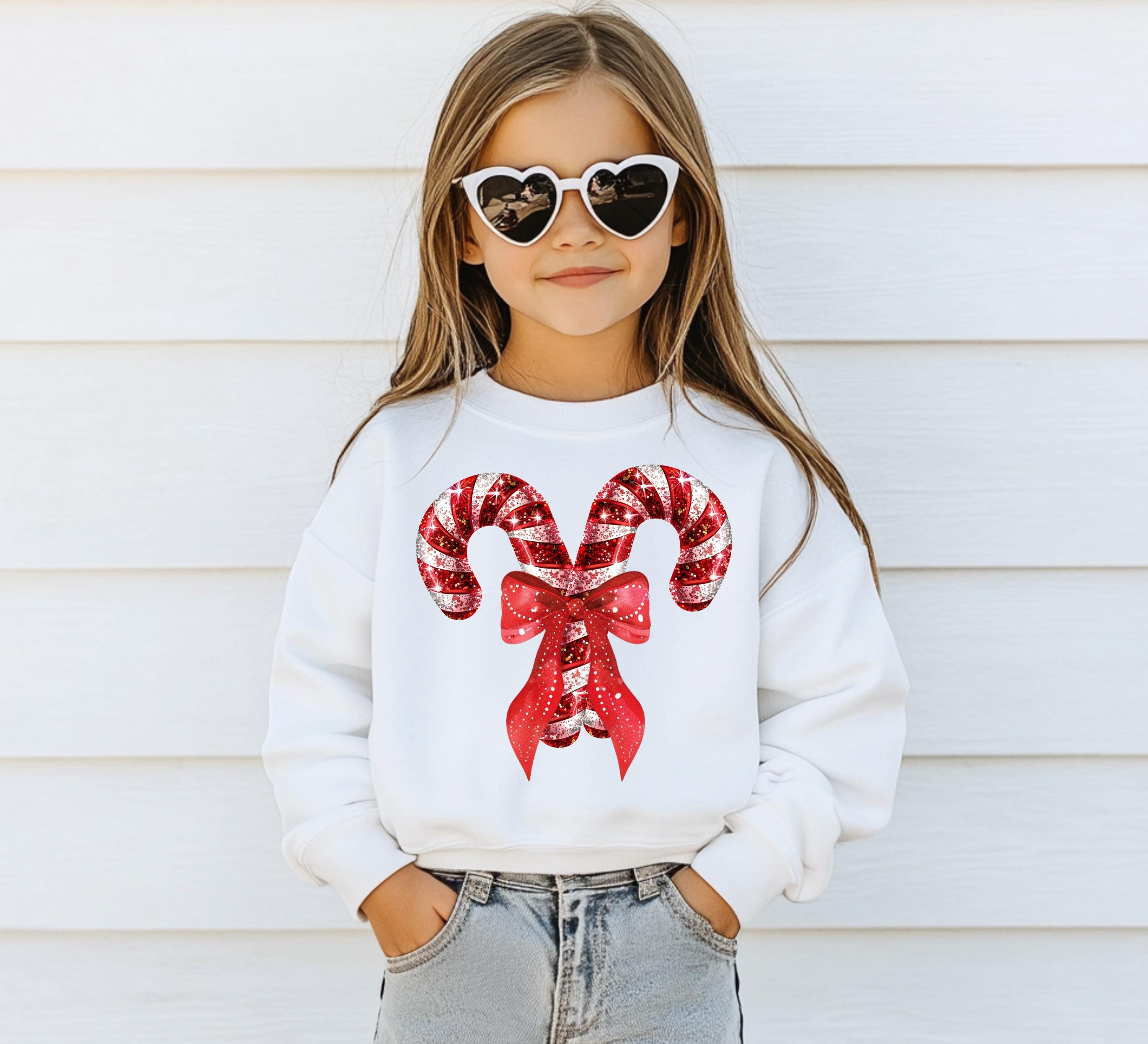 Christmas Candy Cane Bows Youth Sweater, Christmas Sweatshirt, Santa Shirt, Kids Holiday Design, Retro Christmas Long sleeve Crewneck